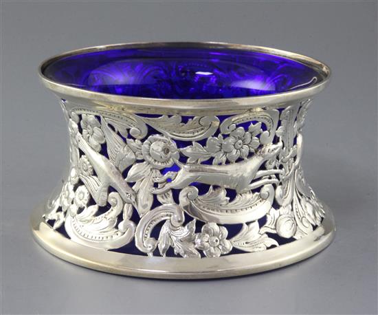 An Edwardian repousse silver dish ring by Williams Birmingham, Ltd, 12 oz.